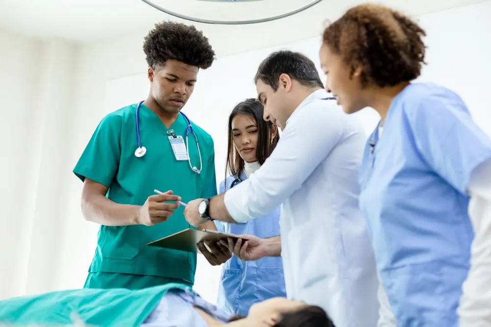 clinicians consulting with patient