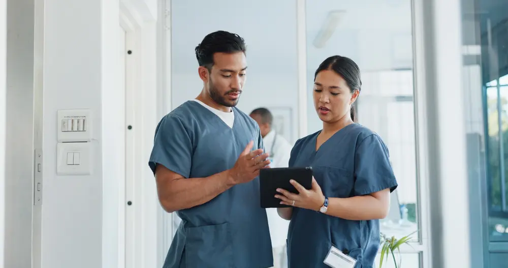 Doctors with a table discussing care
