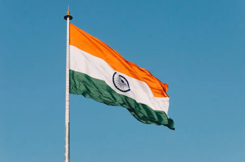 India's flag against a blue sky