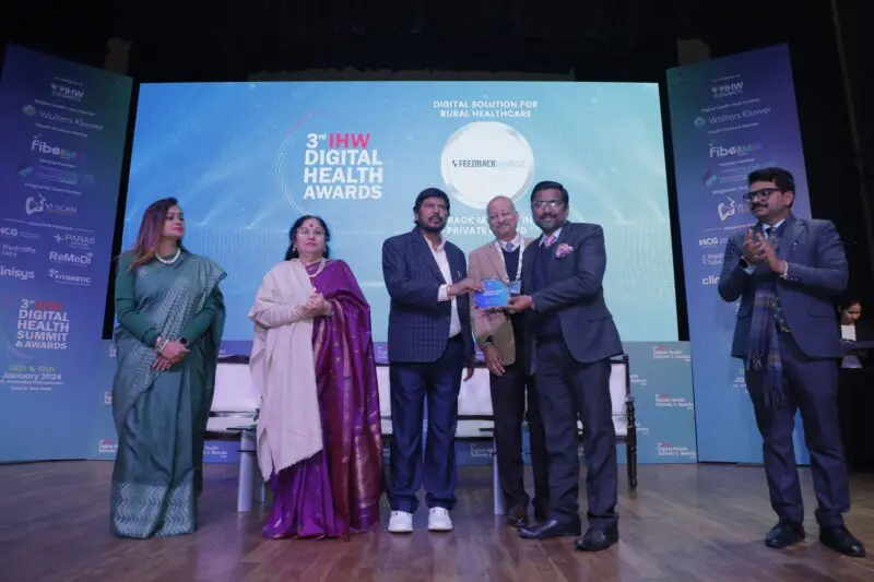 Dignitaries at the IHW Digital Health Award presenting Gold Award to Rohit Singh, Feedback Medical