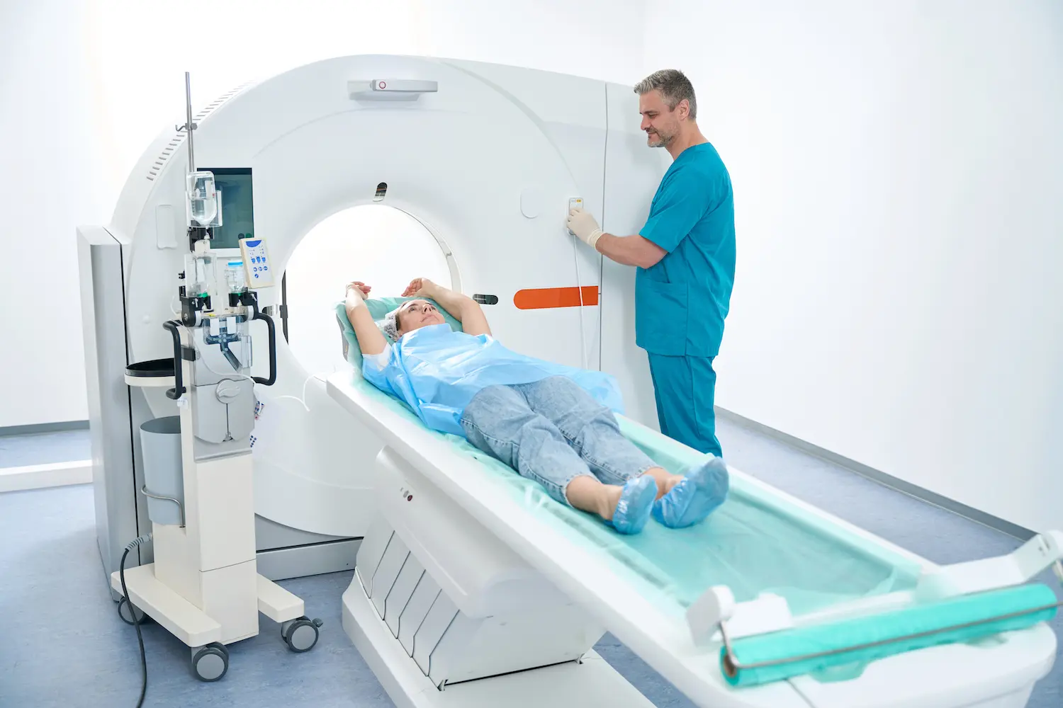 Healthcare professional taking ct scan of patient