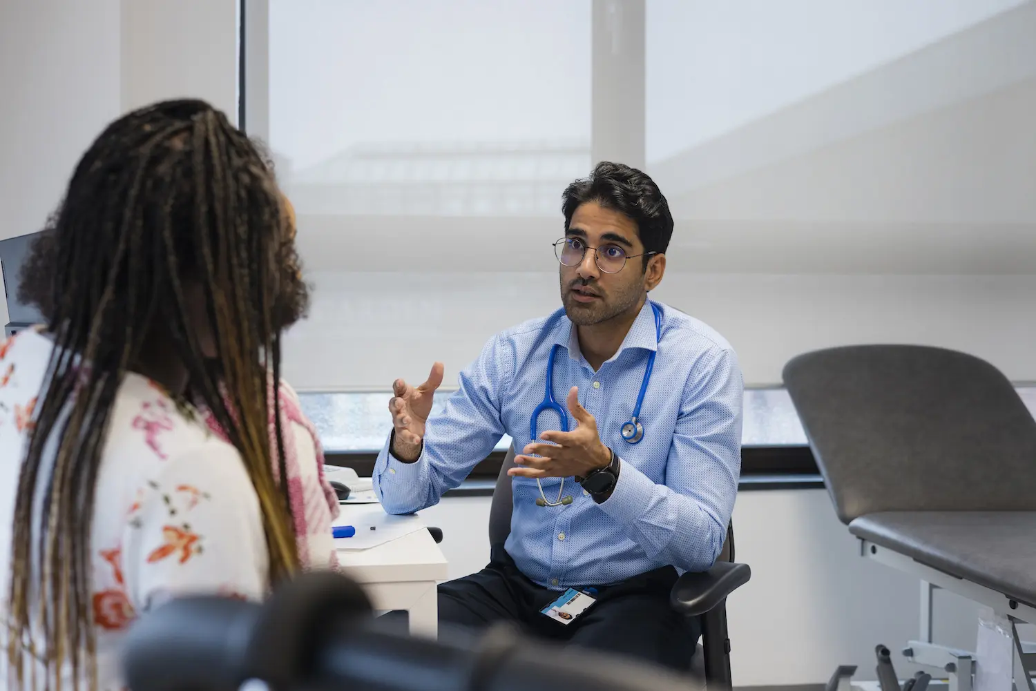 Doctor talking to patient