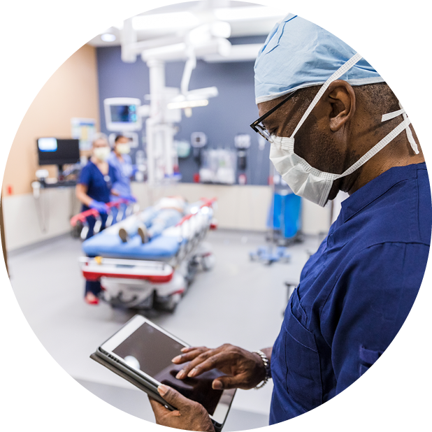 Surgeon on table in operating theatre