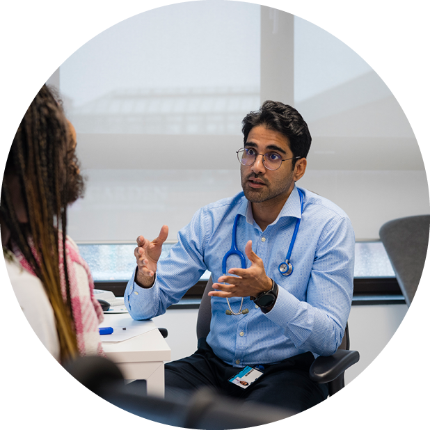 Clinician talking to patient