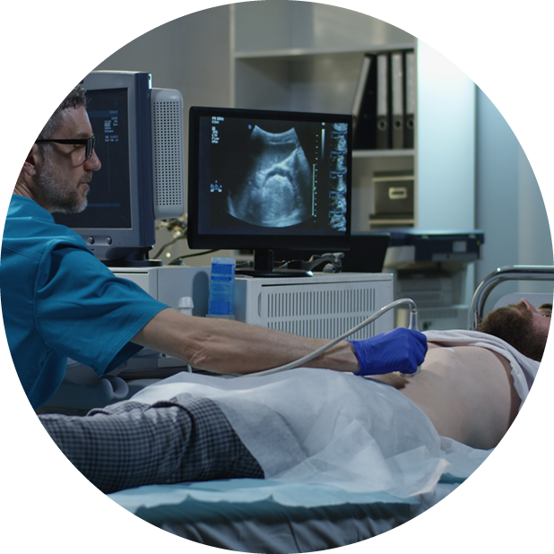 Healthcare professional doing ultrasound on patient