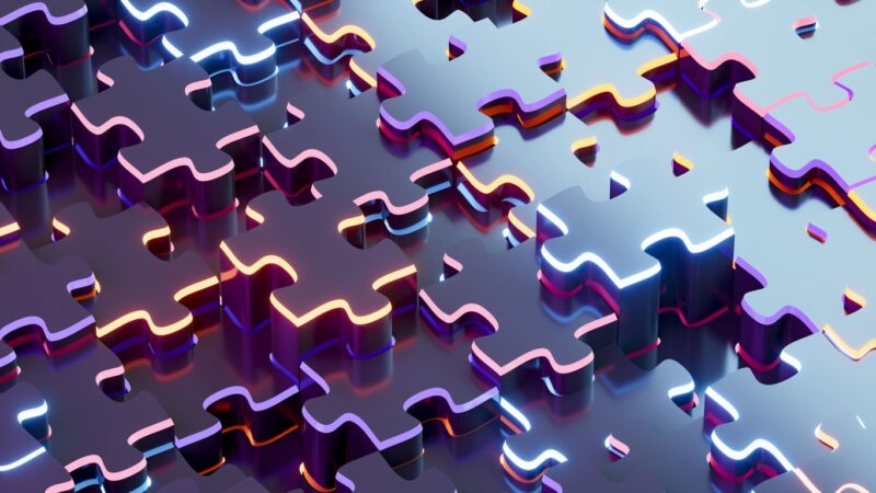 Image of digital jigsaw puzzle representing integration, connecting digital systems